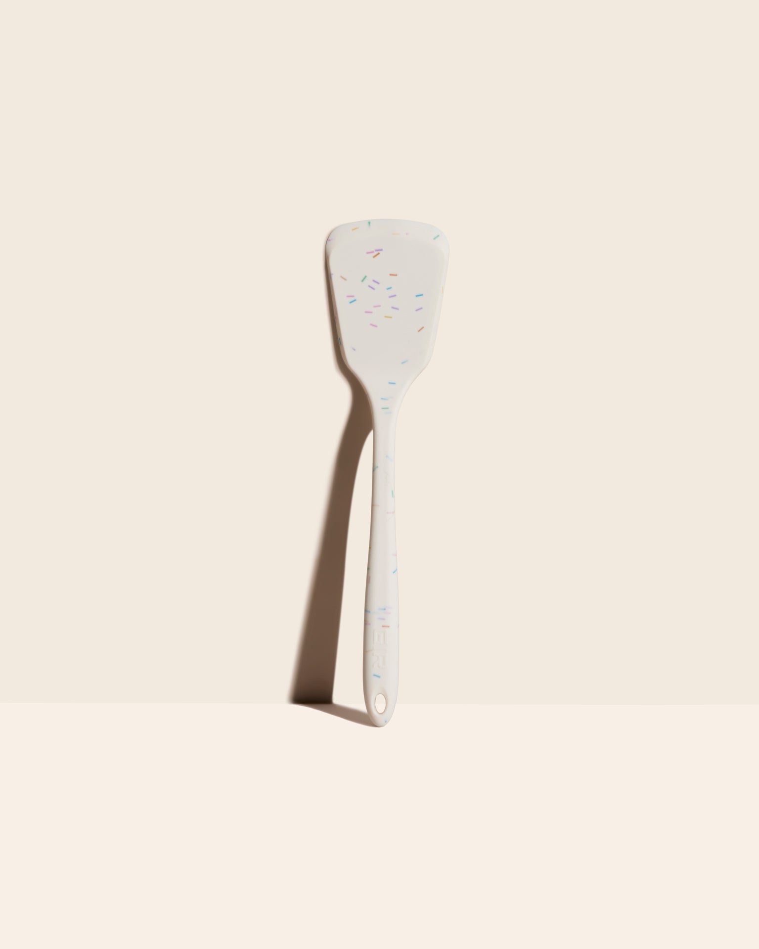 The GIR Ultimate Turner in Sprinkle on a cream background. 