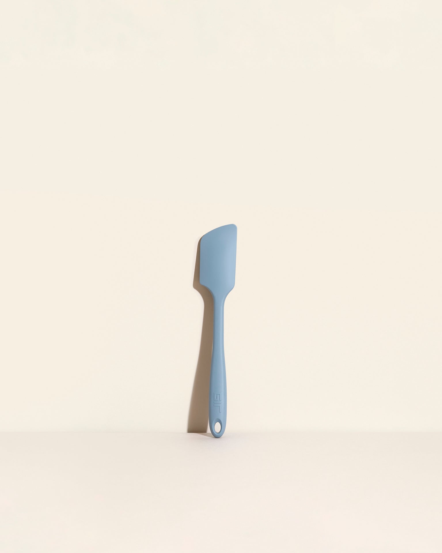 The Slate Ultimate Spatula on a cream background.