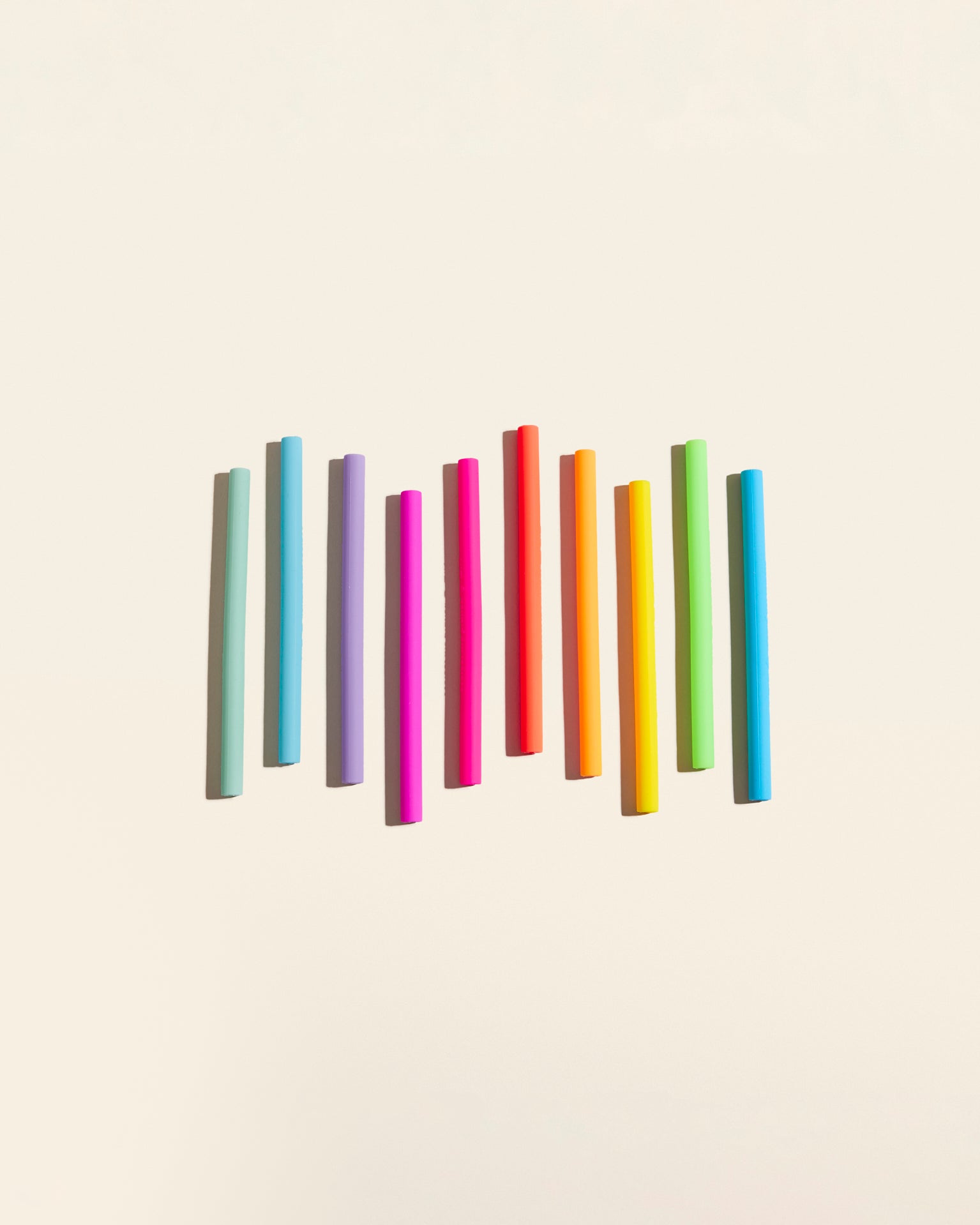 The GIR Kids Straw in Rainbow on a cream background. 