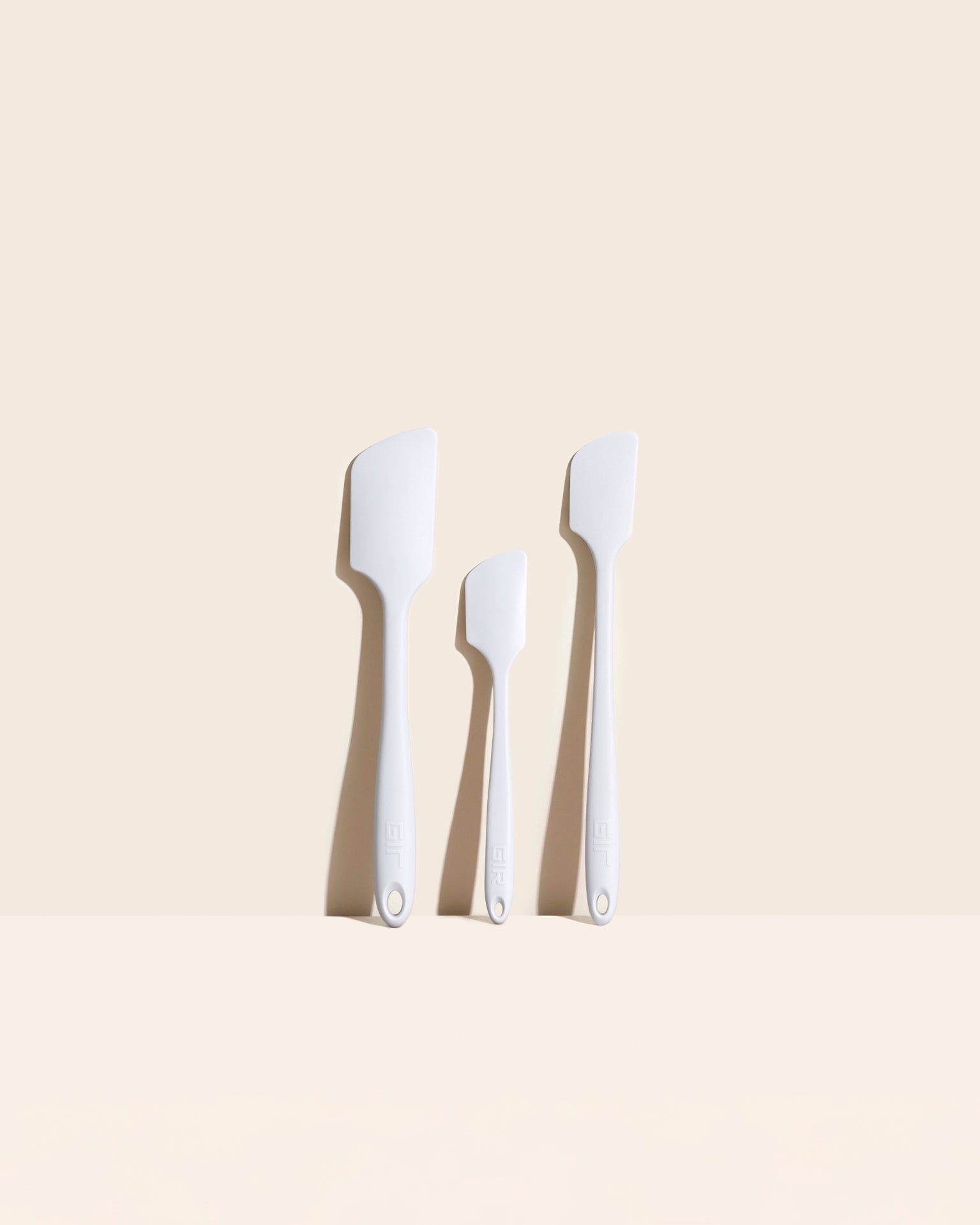 The GIR Studio 3 Piece Spatula Set on a cream background. 