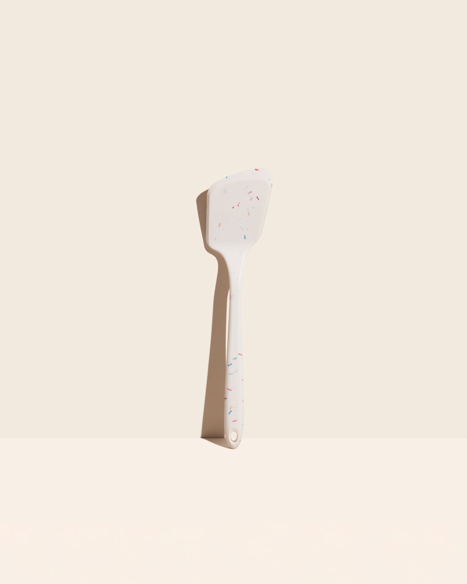 The Sprinkle Ultimate Flip on a cream background. 