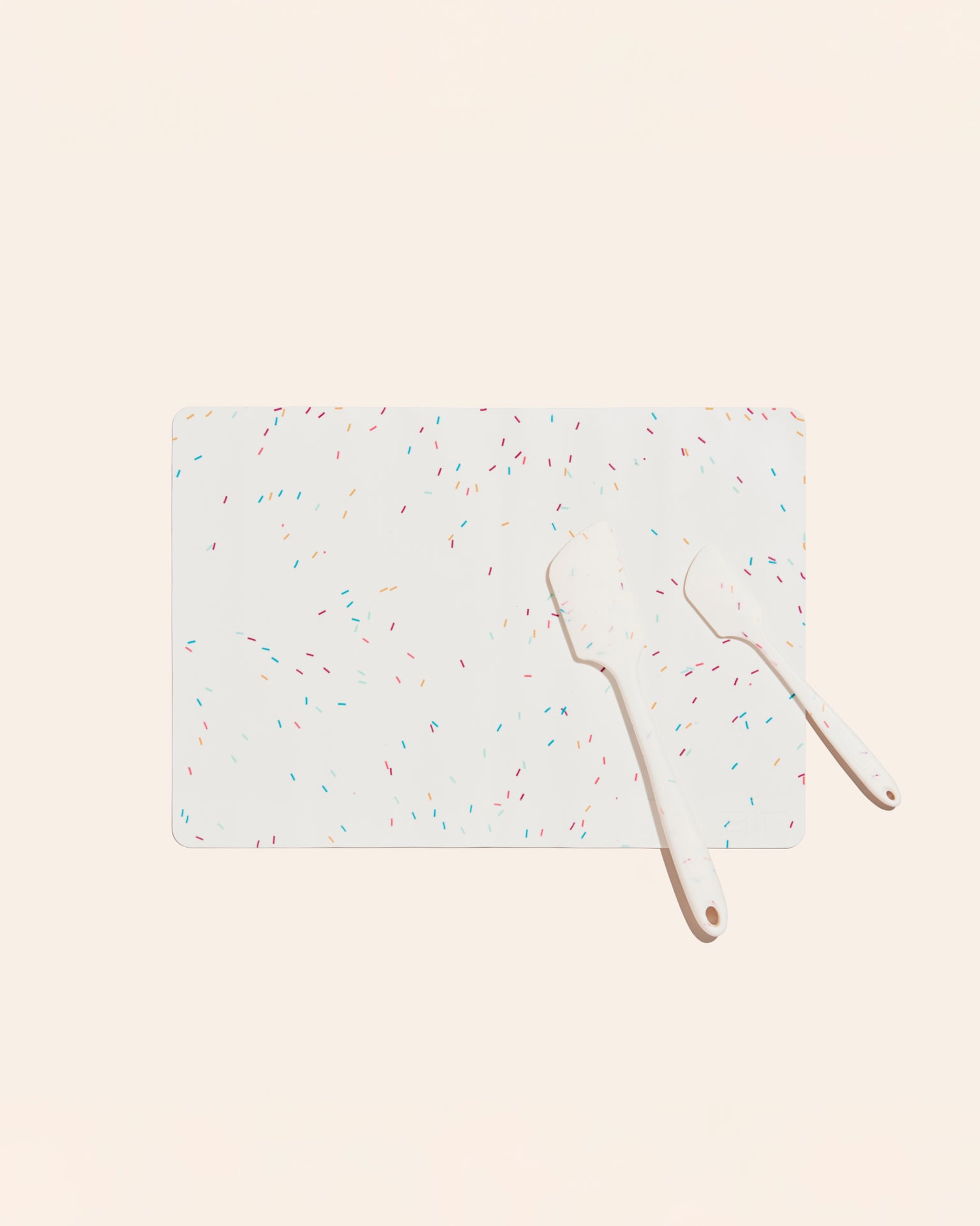 The 3 Piece Baking set in Sprinkles on a cream background. 